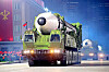 A new type of intercontinental ballistic missile (ICBM) paraded on an 22-wheeled transporter erector launcher during a military parade in Pyongyang's Kim Il Sung Square on Saturday, the 75th anniversary of the North's ruling Workers' Party. [NEWS1]