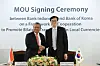 Bank of Korea Gov. Rhee Chang-yong, right, poses for a photo with his Indonesian counterpart, Perry Warjiyo, on the sidelines of Finance Ministers and Central Bank Governors Meeting in Songdo, west of Seoul, on Tuesday. [BANK OF KOREA]