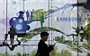 A man passes by Samsung Electronics' shop in Seoul, South Korea, Wednesday, Jan. 31, 2024. [AP/YONHAP]