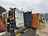 A snow truck fallen sideways at a crossroad in Cheorwon County, Gagnwon, on Thursday. [YONHAP]