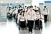 Yoon Kyung-sun, head of the Korean Paralympic delegation, center, and Team Korea arrive at Incheon International Airport to head to the Beijing Paralympics on Feb. 25. [YONHAP]