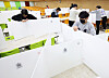Teaching staff at Samil Technical High School in Suwon, Gyeonggi, on Feb. 27 remove partitions installed at cafeterias as a safety measure to prevent Covid-19, ahead of the new academic semester. [YONHAP]