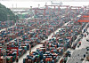Containers are stacked at a pier in Korea's largest port city of Busan on July 4, 2023. [YONHAP]