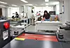 People make leather goods in the Seoul Leather Manufacturing Support Center's workroom in Gangdong District, eastern Seoul, on Thursday. Individuals are required to book a session to use the facility and complete a safety lesson. [PARK SANG-MOON]