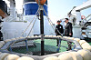President Yoon Suk Yeol, right, inspects devices on the Korean Coast Guard's patrol vessel in Incheon on Tuesday. [PRESIDENTIAL OFFICE]