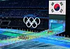 The Olympic delegation of the Republic of Korea, left, parade into the National Stadium in Beijing during the opening ceremony of the Beijing 2022 Olympic Winter Games on Friday. [XINHUA/YONHAP]