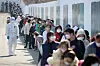 People wait in line to get tested for Covid-19 at a screening center in Daegu on Wednesday.