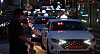 A passenger waits for a taxi near Seoul Station, central Seoul. [YONHAP]