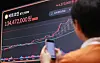 A screen at the Bithumb Lounge in Seocho District, southern Seoul, shows the price of Bitcoin in the wake of the short-lived martial law order on Wednesday.