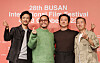 From left: actor John Cho, director and actor Justin Chon, actor Steven Yeun and director Lee Isaac Chung pose for a photo during the press conference for the “Special Program in Focus: Korean Diasporic Cinema” session at the KNN Theater in Busan on Friday. [SONG BONG-GEUN]