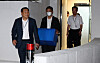 Investigators from a special counsel team carry a box of documents confiscated from the headquarters of Sambu Construction in Seoul on July 3 as part of a probe into stock price manipulation allegations involving Kim Keon Hee, wife of former President Yoon Suk Yeol. [JOINT PRESS CORPS]