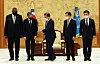 President Moon Jae-in, center, greets, from left, Defense Secretary Lloyd Austin and U.S. Secretary of State Antony Blinken at the Blue House in central Seoul Thursday, with Korean Foreign Minister Chung Eui-yong and Defense Minister Suh Wook looking on. [YONHAP]