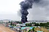 Smoke billows from a Kumho Tire plant in Gwangju, some 270 kilometers south of Seoul, on May 17 [YONHAP]