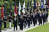 President Yoon Suk Yeol, front, inspects an honor guard as he visits Arlington National Cemetery near Washington with first lady Kim Keon-hee Tuesday. [JOINT PRESS CORPS]