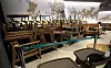 Chairs and tables are stacked up at a corner of a Starbucks coffee shop in Seoul Tuesday, as the central government warned the greater Seoul area will be subject to Level 1.5 restrictions within a week. [NEWS1]