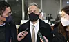 Japanese Ambassador to Korea Koichi Aiboshi, center, is questioned by the press at Korea's Foreign Ministry headquarters in Seoul on Friday when he was summoned by the ministry over the Japanese decision to recommend the Sado mine, where Koreans were forced to labor during World War II, as a Unesco Wolrd Heritage site. [YONHAP]