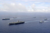 The U.S. nuclear-powered aircraft carrier USS Ronald Reagan, second from left, and South Korea's landing platform helicopter ship Marado, left, sail during a joint military exercise at an undisclosed location on June 4. [DEFENSE MINISTRY]