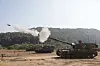 K-9 Thunder self-propelled howitzers participate in a live fire exercise at a firing range in Paju, Gyeonggi, on Sept. 30, 2022. [REPUBLIC OF KOREA ARMY]