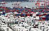 Containers are stacked up at a port in Busan on Sept. 21. [NEWS1]