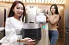 Models with Cuckoo rice cookers. [YONHAP]