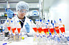 An SK Bioscience researcher conducts tests at the company's lab. [SK BIOSCIENCE]