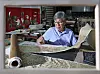 Jeong Chan-jeong is looking through his work in his studio in Yeongdeungpo District, western Seoul ahead of restoring culturally significant Buddhist paintings at Daeheungsa Temple. [PARK SANG-MOON]