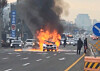 A BMW vehicle is caught on fire in Seongnam in Gyeonggi on Dec. 20. [YONHAP]