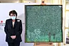 French Culture Minister Roselyne Bachelot poses next to the painting ″Rosebushes under the Trees″ by Austrian painter Gustav Klimt, during an event to announce the restitution of the artwork to a Jewish family from which it had been despoiled in 1938, at the Musee d'Orsay in Paris on Monday. [YONHAP/REUTERS]