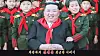 A screen capture of the music video for 'Friendly Father,' the latest North Korean propaganda song, showing North Korean leader Kim Jong-un and schoolchildren. [SCREEN CAPTURE]