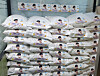 The newly-harvested rice donated last week by ″Young-woong Sidae,″ a fan club of trot singer Lim Young-woong, is piled up at the Catholic House of Love and Peace, which makes and delivers lunch boxes for residents in slums near Seoul Station in central Seoul. [YOUNG-WOONG SIDAE]