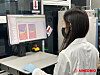 A researcher at AimedBio, a local biotech company specializing in antibody-drug conjugates technology, looks at a monitor in a lab. The Life Science Fund of Samsung C&T, Samsung Biologics and Samsung Bioepis announced Wednesday that it made an equity investment in the local company.  [SAMSUNG BIOLOGICS]