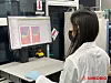A researcher at AimedBio, a local biotech company specializing in antibody-drug conjugates technology, looks at a monitor in a lab. The Life Science Fund of Samsung C&T, Samsung Biologics and Samsung Bioepis announced Wednesday that it made an equity investment in the local company. [SAMSUNG BIOLOGICS]