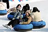 Citizens enjoy their day out at the Ttukseom Hangang Park in eastern Seoul on the snow sled. [JOONGANG ILBO]