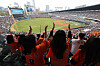 Spectators cheer during a baseball match between the Hanwha Eagles and the Doosan Bears at Jamsil Baseball Stadium in southern Seoul on Wednesday. [YONHAP]