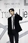 Hwang Min-hyun poses during his solo debut showcase on Monday at the Yes24 Live Hall in eastern Seoul’s Gwangjin District the same day. [PLEDIS ENTERTAINMENT]