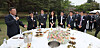 President Moon Jae-in, left, speaks to reporters at his final press conference at the Nokjiwon presidential garden in the Blue House in central Seoul Monday afternoon two weeks before the end of his five-year term. [JOINT PRESS CORPS]