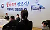 Flanked by SK Group Chairman Chey Tae-won, President Moon Jae-in, far left, listens to a researcher at SK Bioscience, a Covid-19 vaccine developer in Seongnam, Gyeonggi, about her staff’s endeavor to fight the virus, on Oct. 15. [JOINT PRESS CORPS]