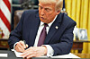U.S. President Donald Trump signs an executive order on birthright citizenship in the Oval Office of the White House in Washington on Jan. 20. [AP/YONHAP]