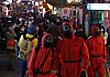 People dress up as characters from Netflix popular series 'Squid Game' and celebrate Halloween in Itaewon, central Seoul, on Friday. [YONHAP]
