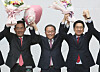 Rep. Yun Jae-ok, center, cheers after he is elected as the new floor leader of the conservative People Power Party (PPP) at the National Assembly in Yeouido, western Seoul, on Friday. [NEWS1]
