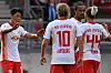 Hwang Hee-chan of RB Leipzig, left, celebrates with his teammates after scoring his first goal of the season during the DFB-Pokal Cup against FC Nurnberg in Nuremberg,Germany, on Saturday. [EPA/YONHAP]