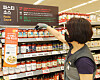 An employee displays pasta sauces at Emart’s Seougsu branch in eastern Seoul. At Emart, some 100 different pasta sauces are available so far. [EMART]