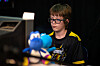 In an image provided by David Macdonald, Willis Gibson, 13, of Stillwater, Okla., at the 2023 Classic Tetris World Championship, where he placed third overall, in Portland, Ore., in October. [David Macdonald via The New York Times]