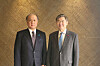 Korean National Security Adviser Cho Tae-yong, right, poses for a photo with Japanese National Security Secretariat Secretary General Akiba Takeo at the Yongsan presidential office in central Seoul ahead of bilateral talks Friday. They will hold a trilateral meeting with U.S. National Security Adviser Jake Sullivan on Saturday. [PRESIDENTIAL OFFICE]