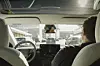 A Tesla robotaxi drives with a safety monitor sitting in the passenger seat in Austin, Dec. 9, 2025. Shares of Tesla have hit new highs on optimism about the company’s self-driving taxis. But experts say Tesla is far behind Waymo, which has a big head start. (Ariana Gomez/The New York Times)