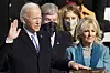 Joe Biden is sworn in as the 46th president of the United States by Chief Justice John Roberts, and his wife, Jill Biden, holds the Bible in the inauguration ceremony at the U.S. Capitol in Washington Wednesday. [UPI/YONHAP]