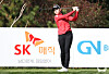 Kim You-bin watches her shot during the first round of the SK Networks Seokyung Ladies Classic at Pinx Golf Club in Jeju on Thursday.