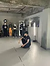 A teacher discussing the concept for his choreography to his students at a regular dance class. [SOFIA DEL FONSO]
