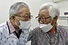 Mr. Lee and Ms. Kim, a married couple, meet for the first time since the outbreak of Covid-19 at a long-term care hospital in Ansan, Gyeonggi, where Lee is hospitalized, on Tuesday. From June, face-to-face visits in nursing homes will be allowed if either the visitor or the patient is fully vaccinated. Kim completed her Pfizer vaccination on April 30. [JOINT PRESS CORPS]