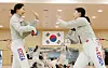 The fencing national team cheer each other on while practicing at the Jincheon National Training Center in Jincheon, North Chungcheong. [NEWS1]